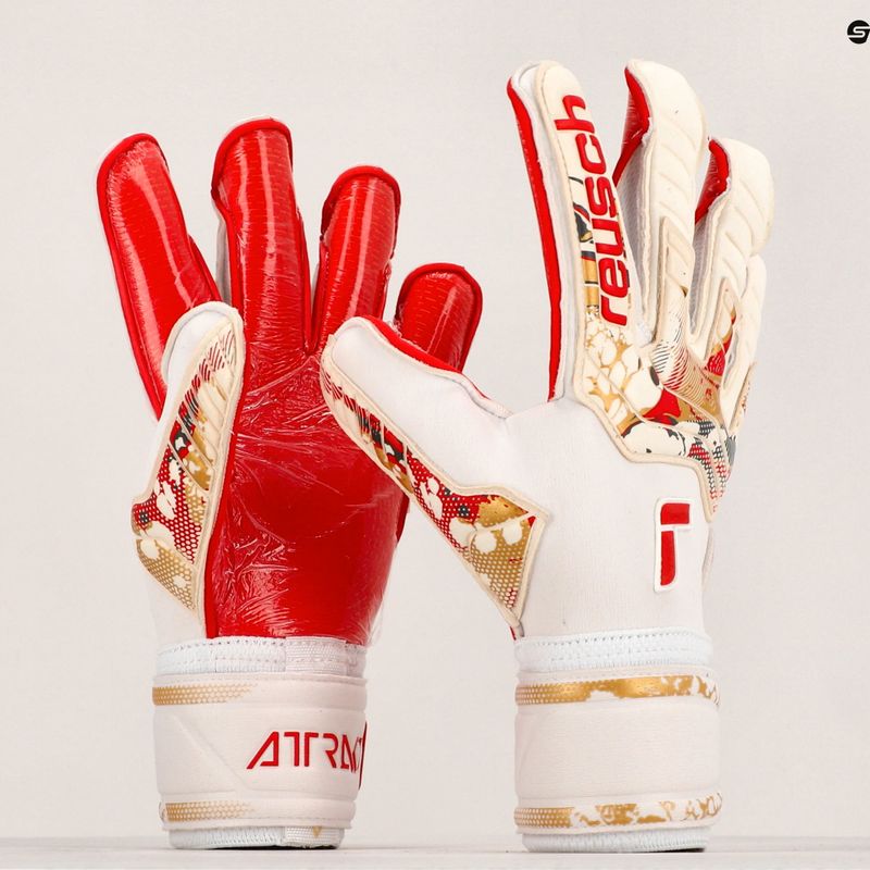 Guanti da portiere Reusch Attrakt Gold X GluePrint bianco/oro/rosso fuoco 10