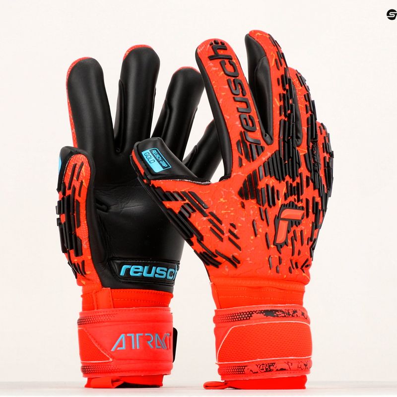 Guanti da portiere Reusch Attrakt Freegel Gold Finger Support rosso brillante/blu futuro/nero 9