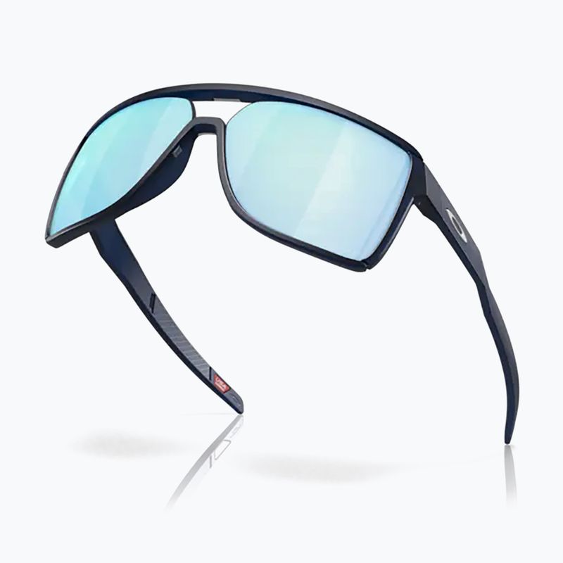Occhiali da sole Oakley Castel matte trans blue/prizm deep water polarizzati 9
