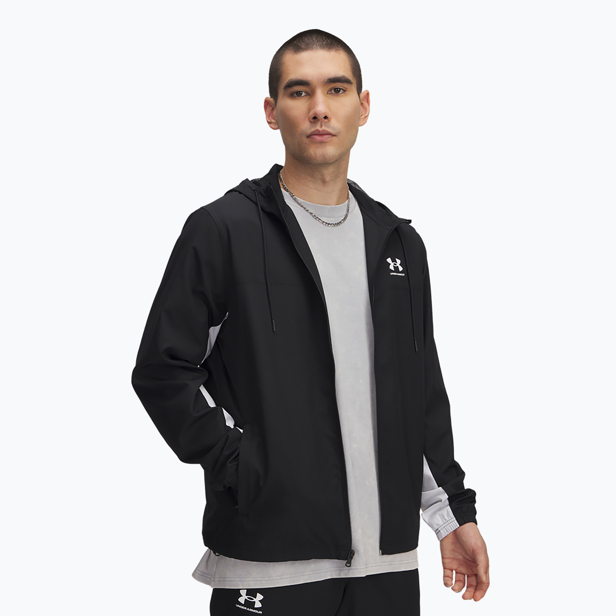 Giacca a vento Under Armour Rival Woven da uomo nero/nero/bianco